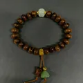 Bracelet traditionnel en perles de bois de rose avec jade verte et détails dorés - Bois de Rose Noir Perles de Boulier avec Pendentif Lotus en Jade Vert