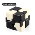 Stress relief infinity cube fidget toy in minimalist black and white plastic design - Black & White Style