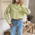 Stylish lime green long-sleeved button-up shirt paired with blue denim jeans and belt - Army Green