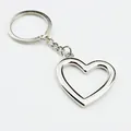 Zilveren metalen hartvormige sleutelhanger voor koppels creatief cadeau-idee - Hol Hart / Zilver