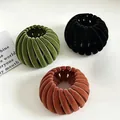 Three velvet bird's nest hair rings in green, black, and orange colors. - Flocked Set (Green/Black/Brick Red)