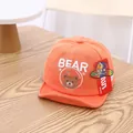 Adorable orange baby baseball cap featuring bear cub embroidery for sun protection - Circle Bear Orange Style