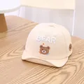 Cute cream baby baseball cap featuring an adorable embroidered cartoon bear motif - Embroidered Bear Beige