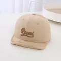 Stylish khaki baby baseball cap featuring soft brim and Royal embroidery details. - Beige Letter Print Style