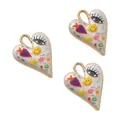 Detailed view of three hand-painted alloy heart charms with colorful patterns - 35*26mm / Style 6
