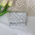 Detailed view of a metallic silver quilted PU coin purse with a secure snap button closure - Silver Rhombic Pattern