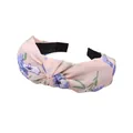 Elegant floral print knotted headband in peach fabric featuring blue flower patterns - Pink Print