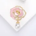 Elegant gold-tone pink enamel rose flower brooch with a hanging white pearl charm. - Rose with Pearl Pendant (XH-1103) / Pink