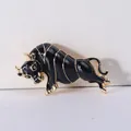 Elegant black enamel charging bull brooch pin with gold-tone accents for clothing - Running Bull Style (XH-1526) / Black