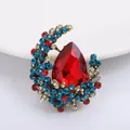 Vintage gold finish crescent moon brooch featuring a large red pear-cut rhinestone - Retro Crescent Red Diamond Style (XH-763)
