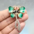 Elegant green enamel butterfly brooch with sparkling rhinestones for garment accessories. - Enamel Butterfly Style (XH-1339)