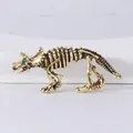 Vintage gold finished triceratops dinosaur skeleton brooch with a tiny green rhinestone eye - Dinosaur Skeleton (XH-1127)