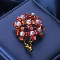 Elegant vintage style flower brooch with white pearls and reddish gold petals on blue - Retro Pearl Red Flower Style (XH-1161)