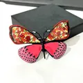 Vibrant enamel butterfly brooch featuring intricate floral patterns and bold pink wings - Colorful Butterfly Enamel (XH-1154)