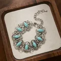 Prachtige vintage armband in boheemse stijl met levendige turquoise edelstenen - Blauw