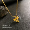 18K gold plated titanium steel bowtie pendant necklace with adjustable chain length - Snake Chain Bow