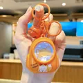 Cute orange cartoon Shiba Inu glowing backpack keychain with a small orange bell - Glowing and Sounding Animal Atmosphere Light - Dog
