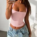Stylish pink ribbed square-neck tank top for women in Y2K style paired with denim jeans - M / Pink