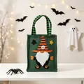 Detail of Halloween burlap tote bag featuring a gnome witch design with striped hat - Green Gnome Style / Green