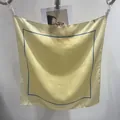 Elegant yellow polka dot small square silk scarf featuring a stylish navy blue border - 109 Square Scarves / 65