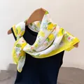 Elegant white silk square scarf featuring vibrant yellow lemon and floral pattern print - Green Leaves Fruit And Yellow Square Scarf / 65