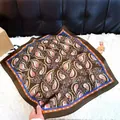 Elegant brown paisley print square silk scarf featuring a vibrant blue and orange floral border - New Silk Scarf 162 / 65