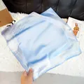 Elegant light blue square silk scarf featuring a delicate white paisley border pattern - New Silk Scarf 173 / 65
