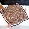 Elegant leopard print square silk-like scarf featuring a classic dark brown border - New Silk Scarf 152 / 65
