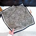 Elegant square silk-like scarf with classic leopard print and black border finish - New Silk Scarf 151 / 65