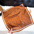 Elegant paisley print square silk scarf for women in warm orange and brown tones - New Silk Scarf 157 / 65