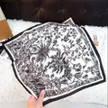 Elegant black and white floral square scarf for women featuring a silk-like botanical print - 141 Square Scarves / 65
