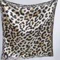 Elegant square leopard print silk scarf featuring classic brown and black patterns - 84 Square Scarves / 65