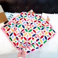 Fashionable multicolor geometric floral print square silk-like scarf with a soft pink border - Silk Scarf 132 / 65