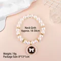 Elegant adjustable pearl pet necklace with bow pendant for small dogs and kittens - One Size / White Bow Black Base Pearl