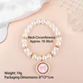 Adjustable elastic pet pearl necklace featuring a cute pink bow pendant for cats and small dogs - One Size / Pink Bow White Base Pearl