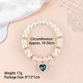 Elegant pet pearl necklace featuring a green heart pendant for cats and small dogs - One Size / Green Heart Pendant
