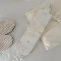 Elegant ultra-thin mesh Lolita style socks with small yellow bowknot pattern in creamy white - One Size / Flocked Bow-Apricot