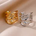 Artistic geometric hollow stainless steel rings in polished gold and silver finishes - Abstract Geometric Flowing Line Style (JZ5105)
