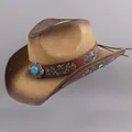 Detail view of a straw cowboy hat with embroidered band and turquoise medallion - Sapphire Decoration Style / Khaki