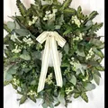 Lush green artificial spring wreath with white flowers and a striped ribbon bow for door - 45cm / Style 123