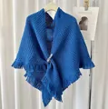 Elegant blue knitted triangular shawl scarf with stylish fringe and buckle detail - Blue
