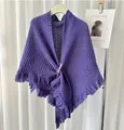 Elegant purple knitted triangle shawl with fringe details and buckle closure. - Purple