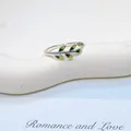 Elegant 925 silver ring featuring a fresh green leaf design and polished finish - Leaf Style (YJ1025)