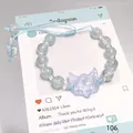 Exquisite blue crystal beaded bracelet featuring a translucent purple fox charm design - Glass Spirit Fox Mask Blue
