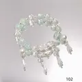 Light green forest style crystal bracelet with pearl charms and silver butterfly - Metal Fox Mask Blue