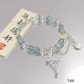 Forest style crystal butterfly bracelet with blue glass beads and shell charm - Scallop Bamboo Joint Blue