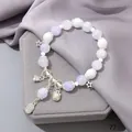 Elegant purple and white crystal beaded bracelet featuring silver star and cat charms - Purple Lucky Cat