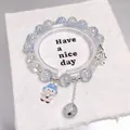 Blue and white crystal bead bracelet with butterfly and rabbit charms - Rabbit with Hat Blue