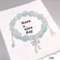 Sky blue starry crystal bead bracelet featuring silver bow and heart charms for women - Heart Bow Blue