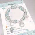 Forest style light blue crystal butterfly charm bracelet with cracked bead accents - Crystal Dream Butterfly Blue